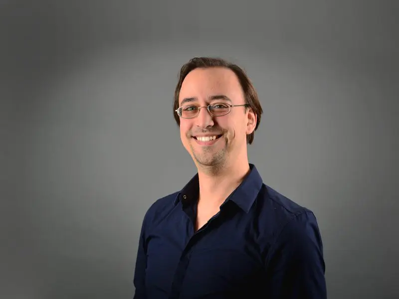 Dr. Christian Thomay